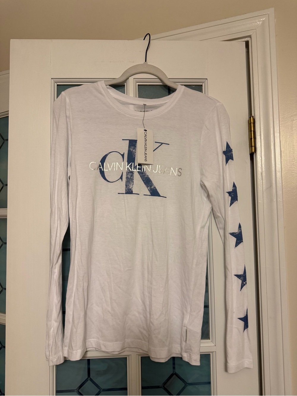Calvin Klein White Long-Sleeve Tee with Blue CK Logo and Stars